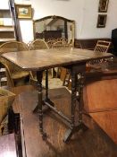 A 1920s/30s mahogany sutherland table, the rectangular top with canted corners and moulded edge on