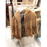 A fur jacket (37cm across shoulders)