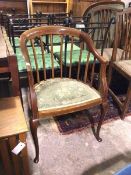 An Edwardian armchair, mahogany with boxwood inlay, with hoop back, with upholstered seat, on