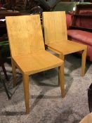 A pair of oak side chairs, latter half of the 20thc., on straight tapering supports (each: 83cm x