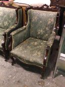 A reproduction 18thc inspired armchair, with pierced and moulded top rail above an upholstered back,