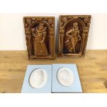 A pair of Minton style decorative wall plaques, one depicting an Elizabethan Gentleman, the other