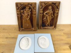 A pair of Minton style decorative wall plaques, one depicting an Elizabethan Gentleman, the other