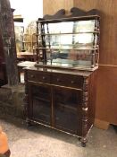 A William IV mahogany and parcel gilt chiffonier, the raised mirror back with three graduated