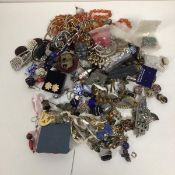 A quantity of costume jewellery, some marked silver, including necklaces, earrings, brooches,