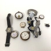A group of watches including open faced pocket watches, one in a silver marked case, another