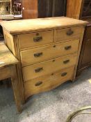 An Edwardian ash chest of drawers, the rectangular top with moulded edge above two short drawers and