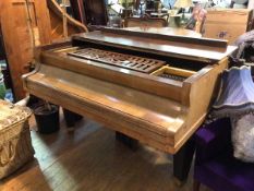 A Ronisch boudoir grand piano, with walnut case, enclosing an iron framed overstrung movement,