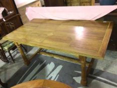 A Flagstone dining table, the oak top with marble inlay, with channelled edges on refectory table