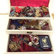 A quantity of costume jewellery including bracelets, necklaces, brooches, sleevelinks etc., all