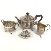 An Epns teaset, with teapot on cabriole supports (15cm x 25cm x 15cm) with sugar bowl and milk jug