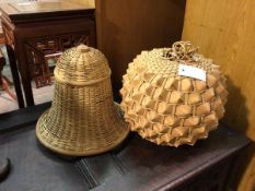 A woven cane pendant shade, in the form of a stylised screwpine, and another wicker hanging shade in