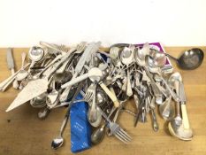 A large quantity of assorted Epns flatware including spoons, knives, ladles, cake lift, pickle