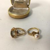 A 14ct gold ring set single pearl, with naturalistic shoulders (N) (5.57g) and a yellow metal ring