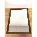 A dressing table mirror with added eyehooks for hanging, in oak bevelled frame (43cm x 33cm)