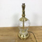 A modern brass and glass table lamp, of baluster form (34cm)