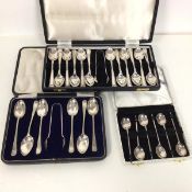 A collection of Epns spoons, including a set of twelve with sugar nips, a further set of six with