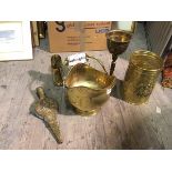 An assortment of brassware including scuttle with ceramic handles, a chalice of baluster form (