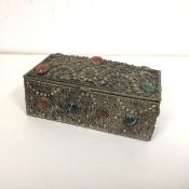 A wirework casket, possibly Indian, with polished stone cabouchons (8cm x 16cm x 9cm)