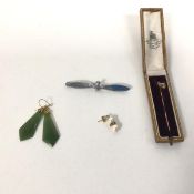 A Hamilton & Inches yellow metal stick pin with a Fox head finial, in original box (pin: 6cm) and