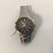 A gentleman's Citizen Ecodrive chronograph style stainless steel and yellow metal quartz