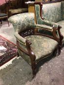 A reproduction 18thc inspired library tub chair, with upholstered back, arms and seat, in a