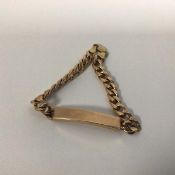 A gentleman's 9ct gold hollow filled kerb link identity style bracelet, stamped 9k (11cm) (8.86g)
