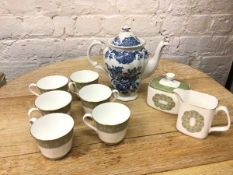 A Royal Doulton teaset, in Sonnet pattern, with six tea cups (7cm), milk jug, lidded sugar bowl, and