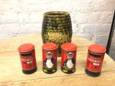 A collection of four novelty saving banks, each in the form of a red postbox with a Sea Captain to