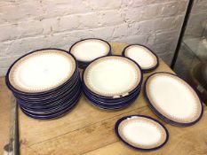A part Royal Worcester dinner service including eighteen dinner plates (27cm), two serving plates,