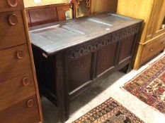 A late 17thc./early 18thc. oak three panel coffer, with arcaded frieze between channelled styles,