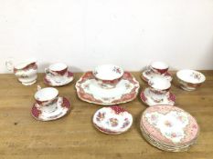 A mixed tea service of Paragon ware, with Rockingham and Honiton patterns, includes four tea cups (