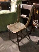 A Victorian beech and elm side chair, with saddle seat, on turned supports united by H stretcher (