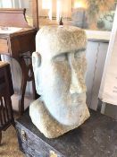 A composition garden statue in the form of a Moai Easter Island Head (60cm x 30cm x 36cm)