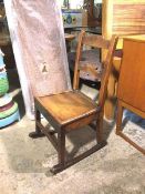 A 19thc mahogany rocking chair, with moulded back rail, above a solid seat, on straight supports