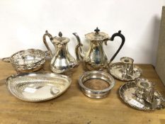 A collection of Epns including two teapots (larger: 24cm), two chamber sticks, wine coaster, navette