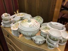 A Pillivuyt French dinner service, the wildflower pattern signed Molling, includes, soup tureen (