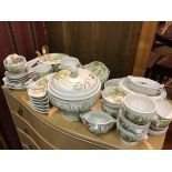 A Pillivuyt French dinner service, the wildflower pattern signed Molling, includes, soup tureen (