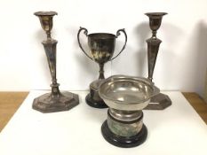 A pair of Edwardian Sheffield plated octagonal candlesticks, with family crest and two