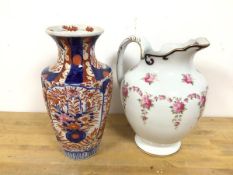 An Imari style baluster shaped vase with ribbed body (31cm) and a ewer stamped Cauldon to base (2)