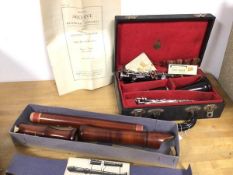A wooden recorder, stamped Lorelei, sole distributors Dallas, London and another wind instrument
