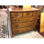 A Regency mahogany bow front chest of drawers, fitted three short and three graduated long