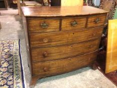 A Regency mahogany bow front chest of drawers, fitted three short and three graduated long