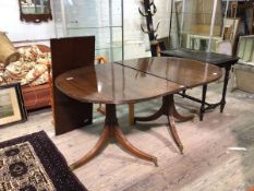 A reproduction mahogany Georgian style double pedestal dining table with reeded edge, single leaf,
