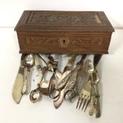 A collectoin of Epns including spoons, pickle forks, knives, grape scissors and a carved, possibly