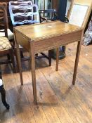 A first half of 20thc. oak side table, with ledge back above a rectangular top with moulded edge,