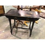 A Victorian ebonised writing desk, the tooled leather skiver on rectangular top with moulded edge