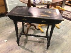 A Victorian ebonised writing desk, the tooled leather skiver on rectangular top with moulded edge