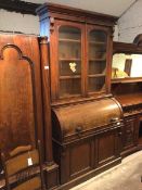 A Victorian mahogany bureau bookcase, the bookcase fitted two glazed doors enclosing adjustable
