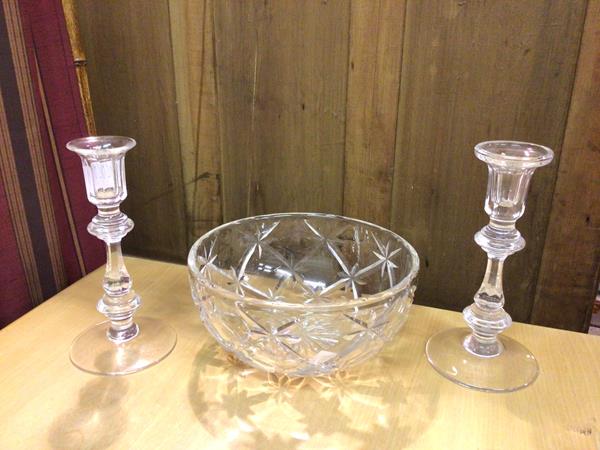 A pair of cut glass candlesticks (20cm) and a cut glass bowl (3)